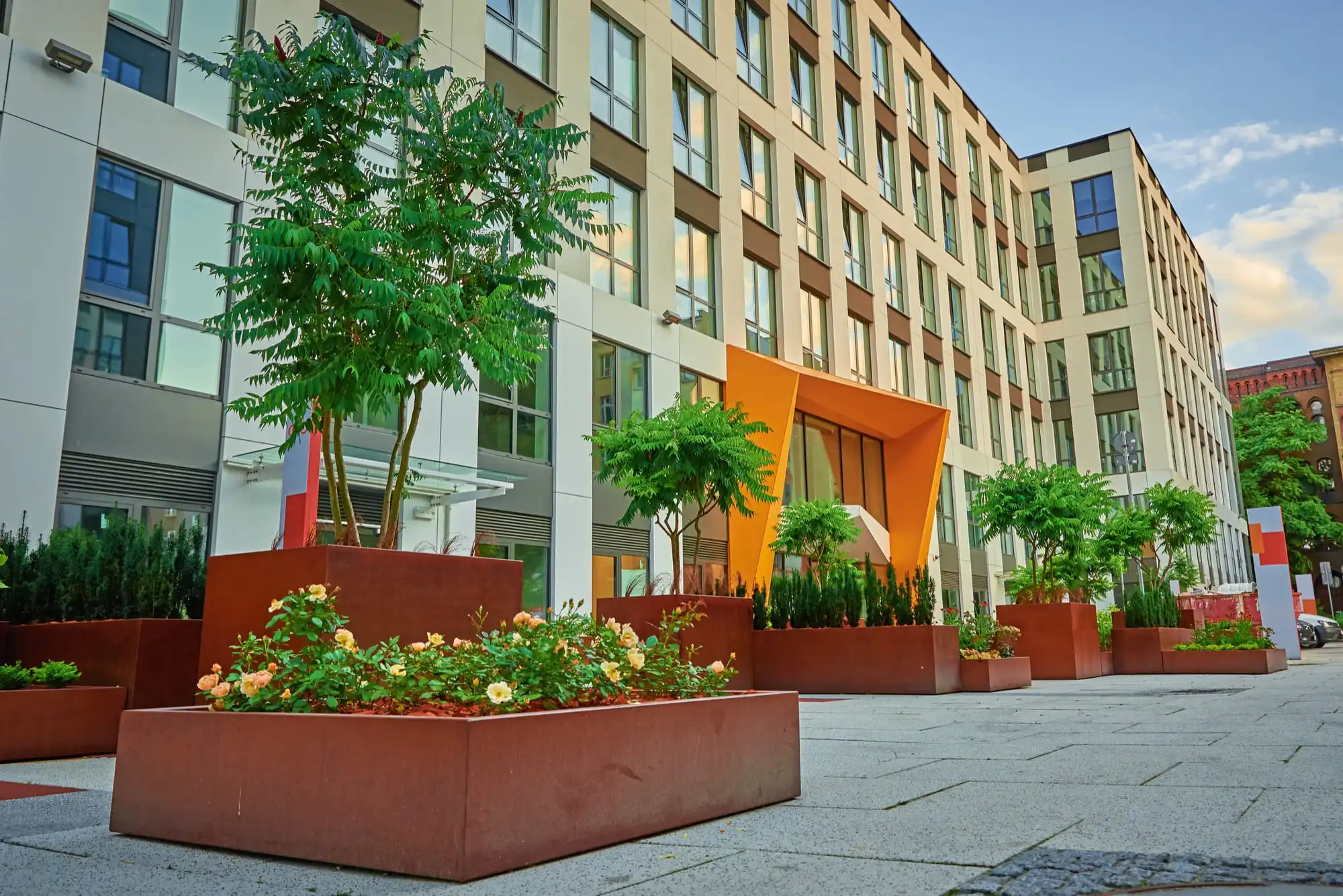 Luxury hotel exterior with modern architecture and beautiful landscaping